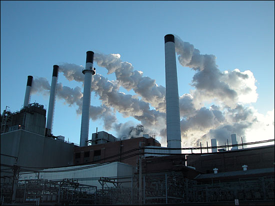 Because of efficient “scrubbers” in smokestacks, nearly 100% of the emissions from most coal burning power plants is only CO2, without toxic pollutants.  Image from BigStockPhoto.