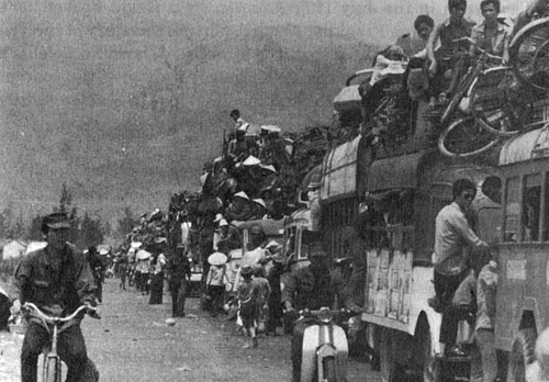 Vietnamese refugees flee from advancing Communist forces, March, 1975.