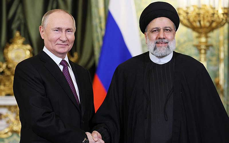 Vladimir Putin and Iran’s President Ebrahim Raisi giving a Masonic handshake